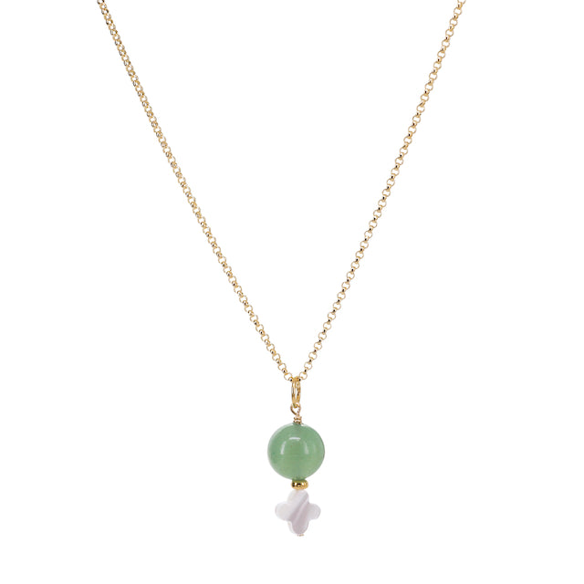Necklace with a green bead and white pendant on a gold chain against a white background