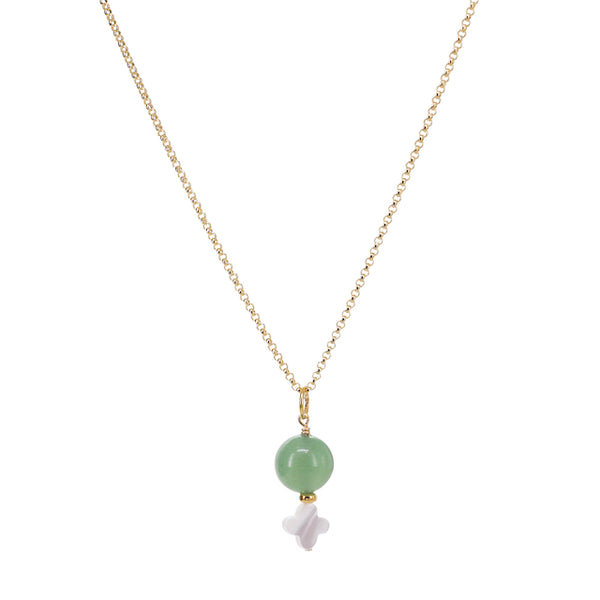 Necklace with a green bead and white pendant on a gold chain against a white background