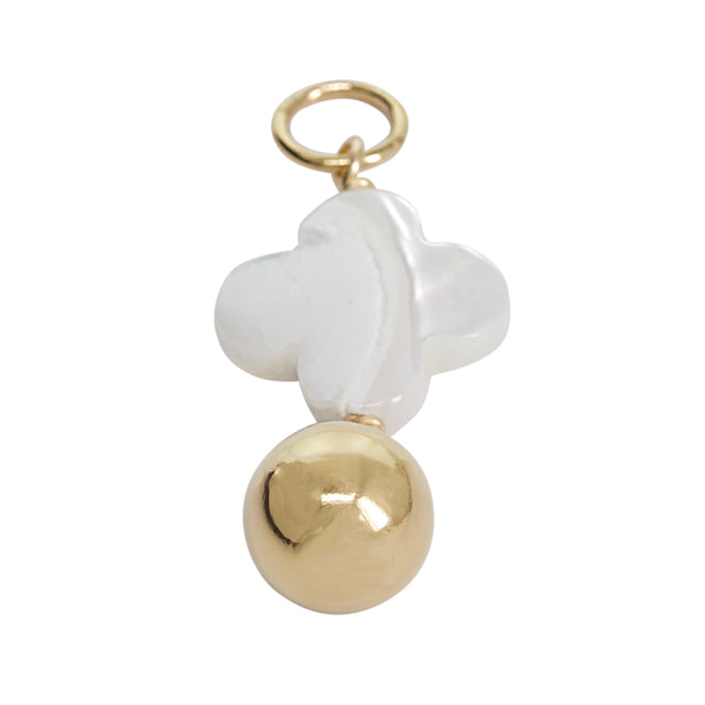 Jewelry charm with white flower bead and gold ball on a white background