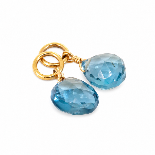 bedels in blauw topaas
