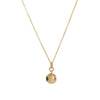 Gold necklace with a round pendant on a white background